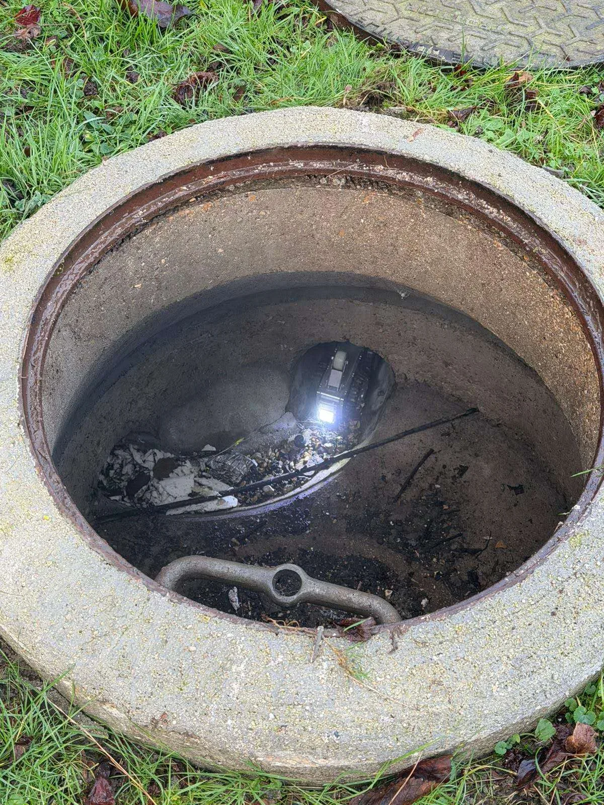 Robot entering sewer